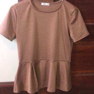 Scoop neck peplum style shirt